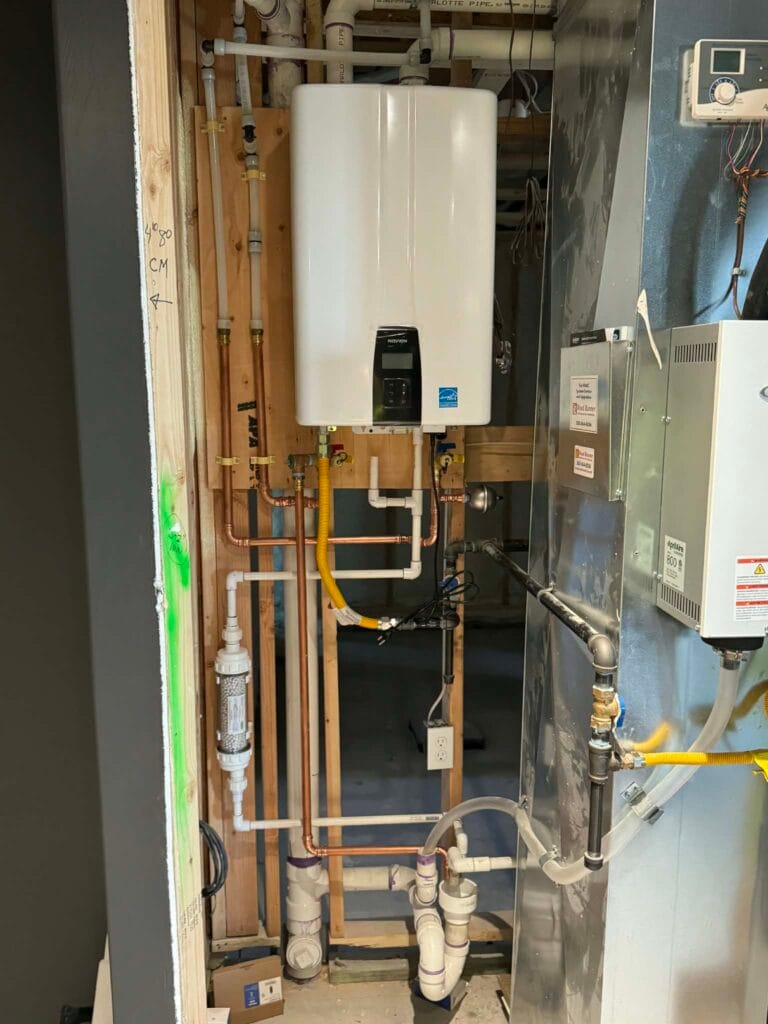 Gallery | Imperial Plumbing LLC Tankless water heater installation with copper piping