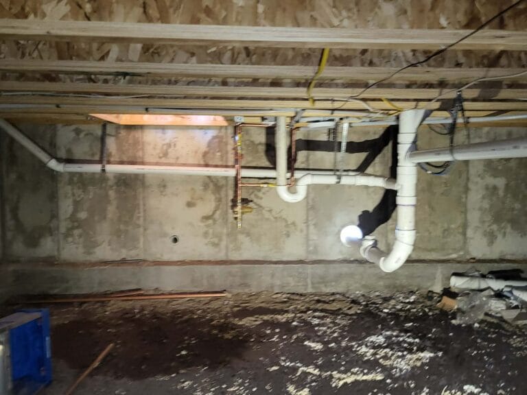 Gallery | Imperial Plumbing LLC PVC drain lines installed under a basement floor
