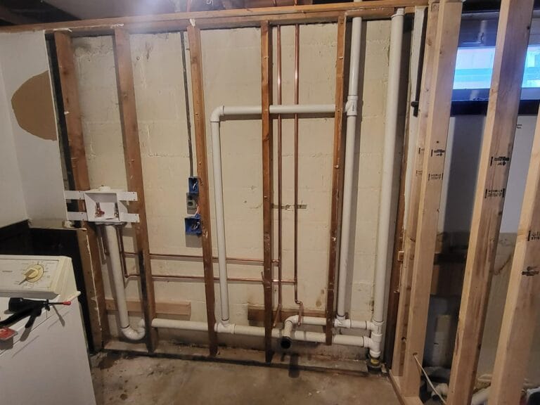 Gallery | Imperial Plumbing LLC Copper water lines in a metal-stud wall during rough-in