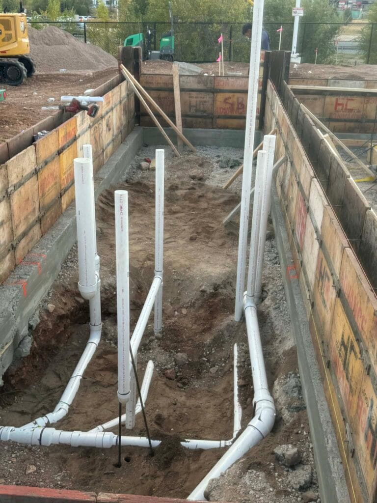 Gallery | Imperial Plumbing LLC PVC drain stub-outs on a new construction slab