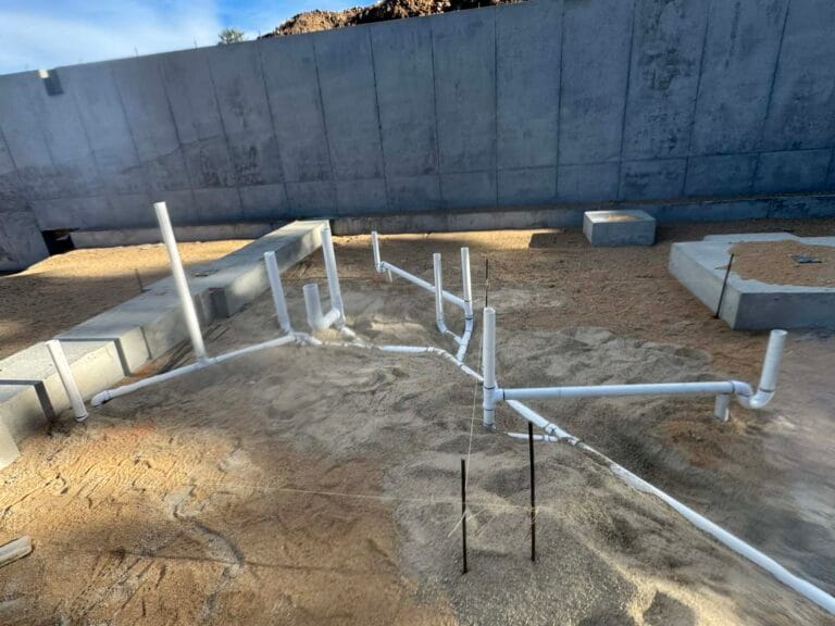 Gallery | Imperial Plumbing LLC PVC drain lines laid in a foundation before the concrete pour