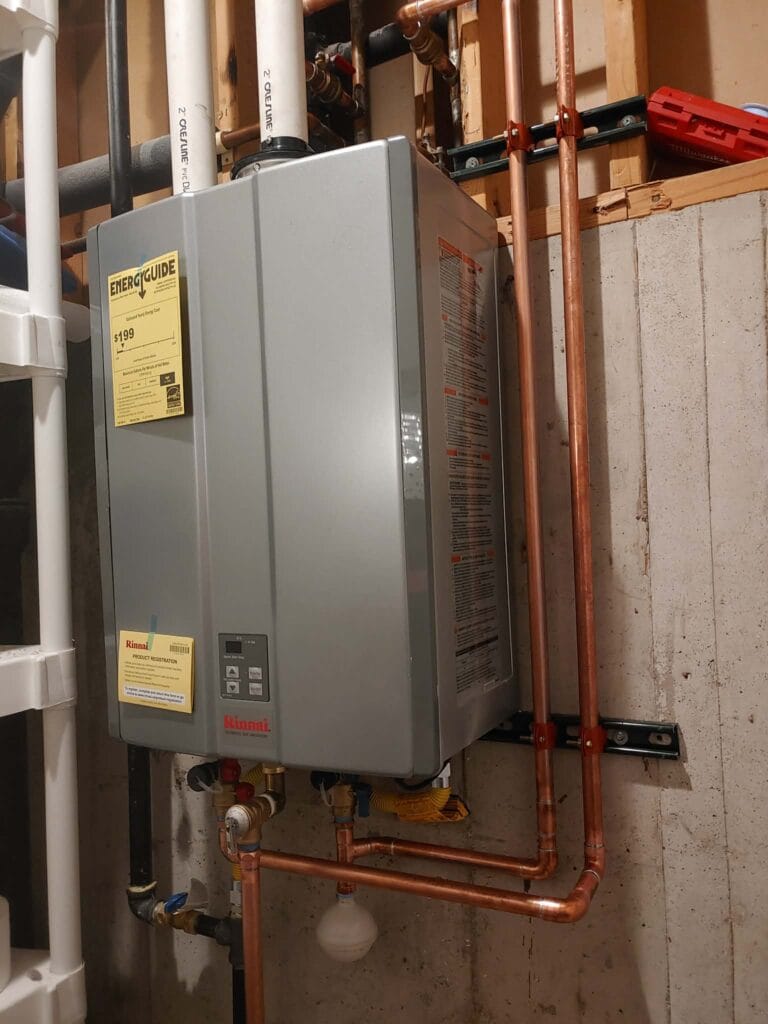 Gallery | Imperial Plumbing LLC Tankless water heater installed with copper piping